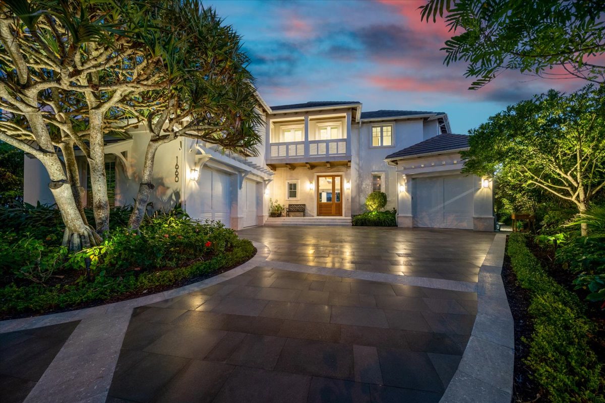 Naples waterfront residence photographed at twilight